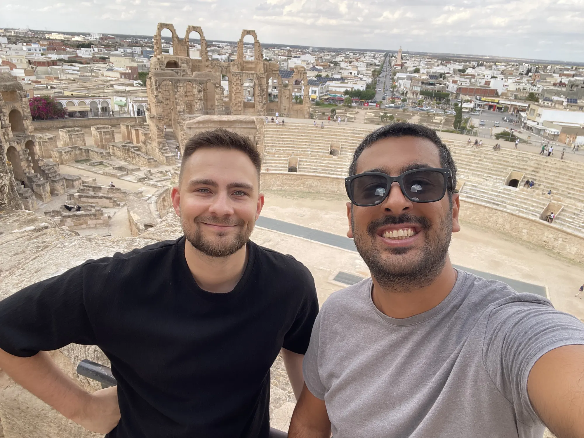 Vojtech and Marouane in a selfie above a Roman amphitheatre
